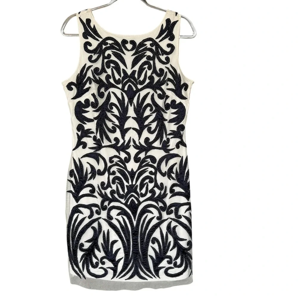 aidan mattox white beaded dress Amazon.com: Aidan by Aidan Mattox Women's Beaded Halter Swing Dress : Clothing, Shoes & Jewelry